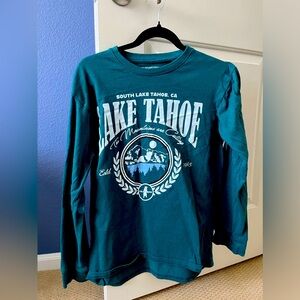Blue long sleeve shirt.